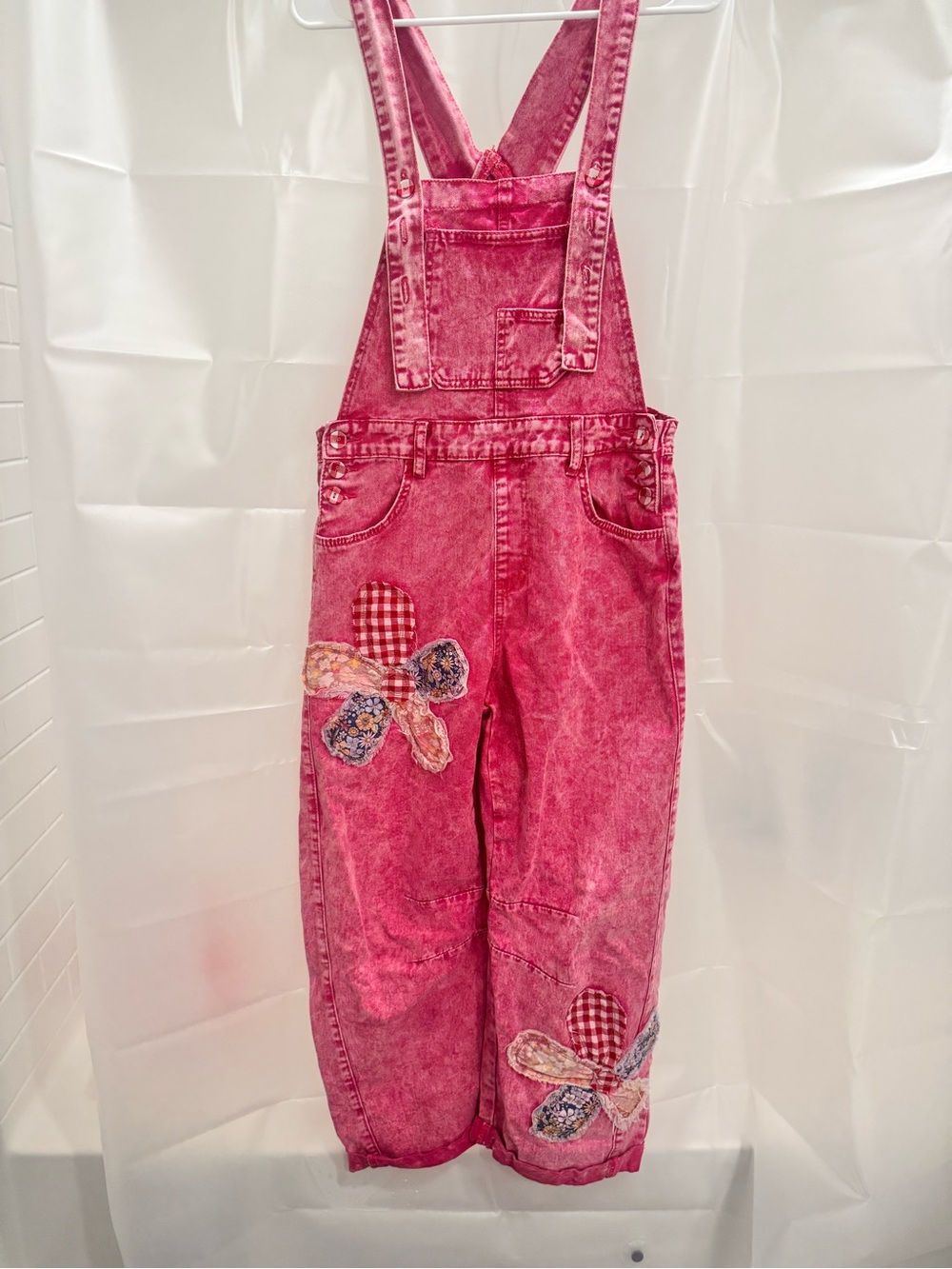 Pink Acid-Wash Overalls with Appliqué Bows
